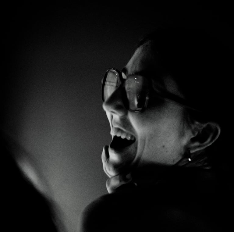 a woman with a toothbrush and a toothbrush in her mouth