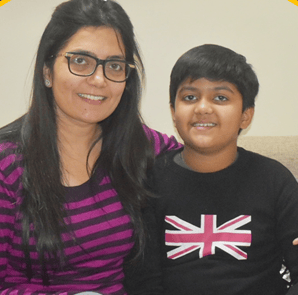 a woman and a man are smiling for a picture