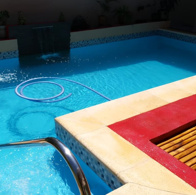a pool with a hose attached to a pool