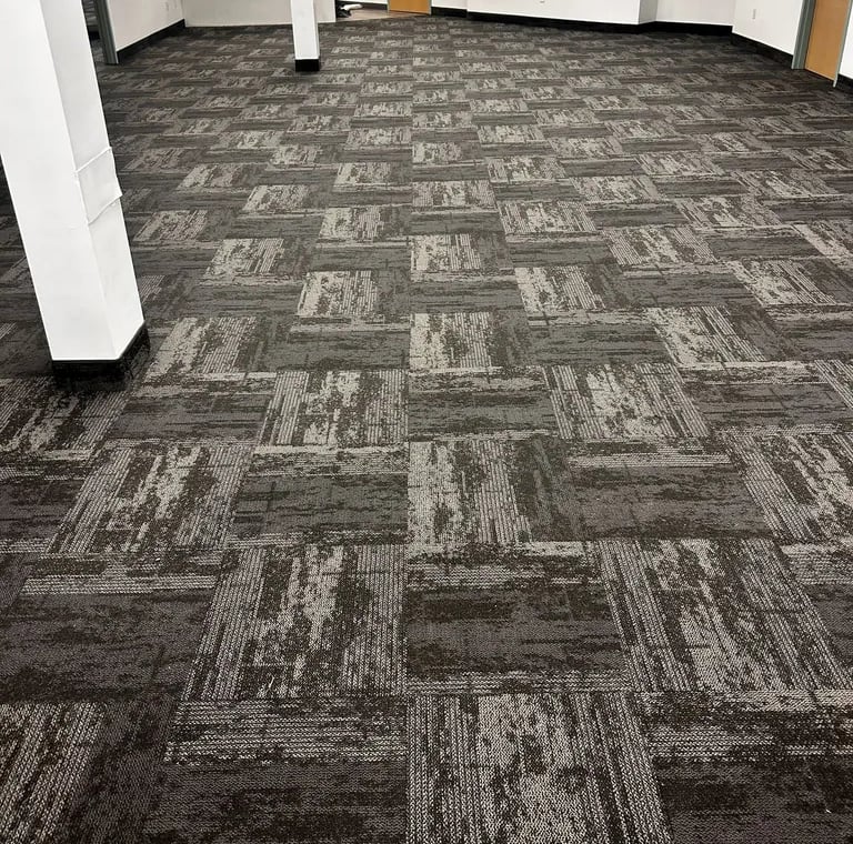 Dark grey design commercial carpet tile installed in conference room, London downtown office