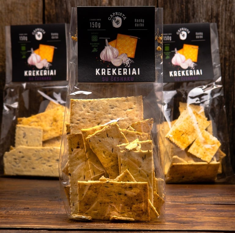 Organic crackers transparent packaging with black labels, handmade illustrations