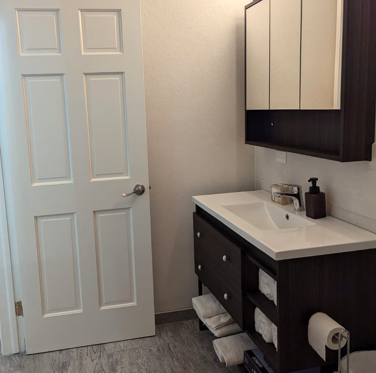 bathroom entry and sink with vanity