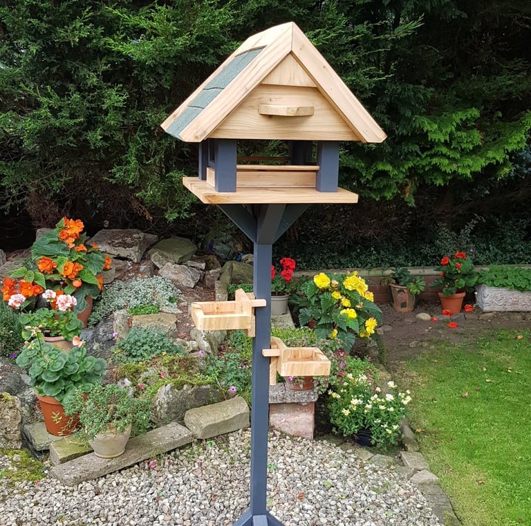 a bird table in a garden