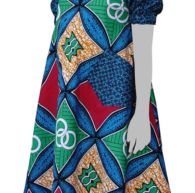 a woman's dress with a colorful pattern
