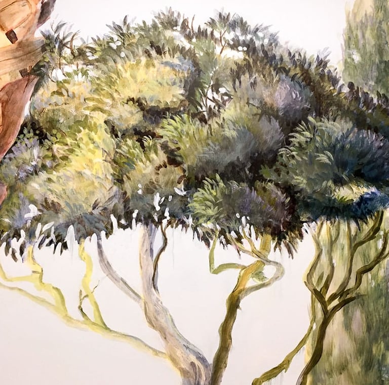 Close look at sun-lit tree crown with thick foliage and a cypress in the back.