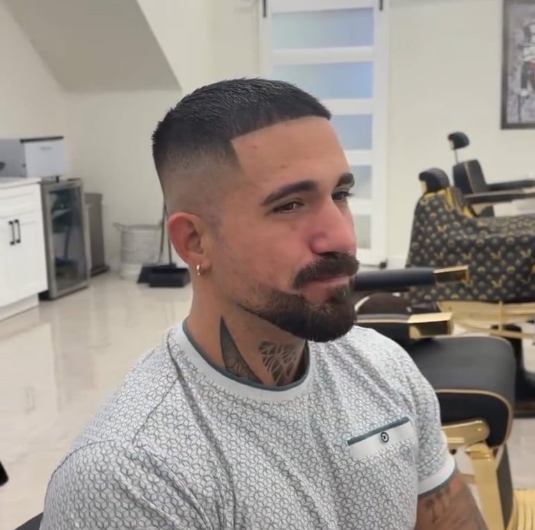 Precision zero fade and sharp beard lineup at Unlimited Barbershop in Etobicoke.