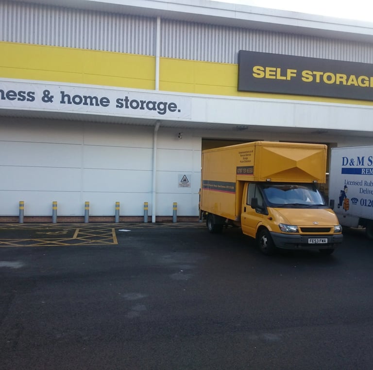 Man and van unloading at a self storage unit in Watford.