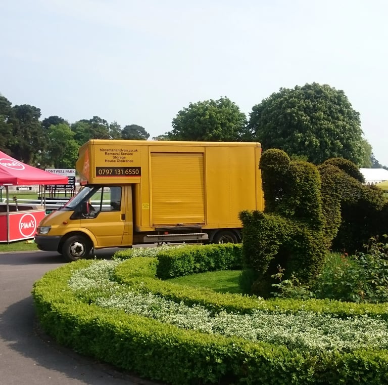 Removal van parked up after a delivery at a fairground