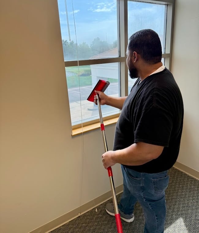 EMPLOYEE DELIVERING EXCEPTIONAL JANITORIAL SERVICES IN WICHITA FOR PRECISION CLEANING SERVICES