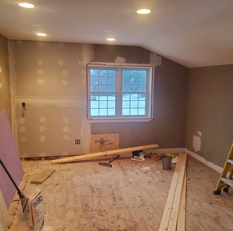 a room with a ladder and a ladder