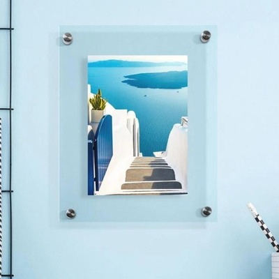 Acrylic frame showing a sea view and white stairs.