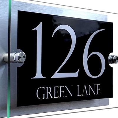 Black and silver acrylic address sign with the number 126 and 'Green Lane' text.
