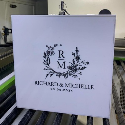 White acrylic wedding box with floral initials and 'Richard & Michelle 03.09.2024