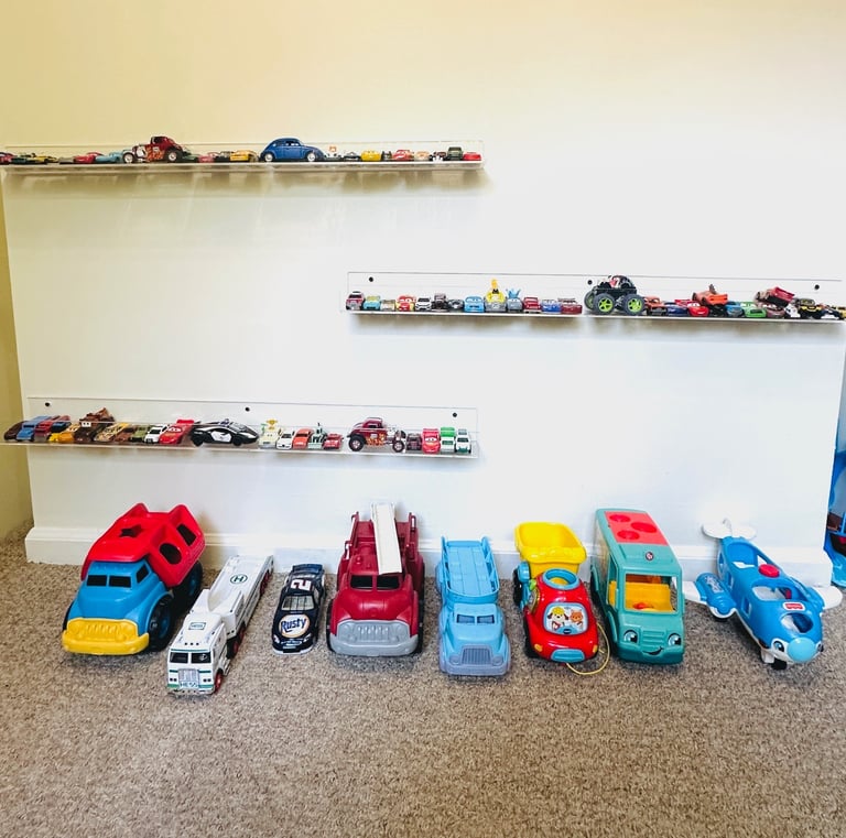 an organized wall of cars and trucks