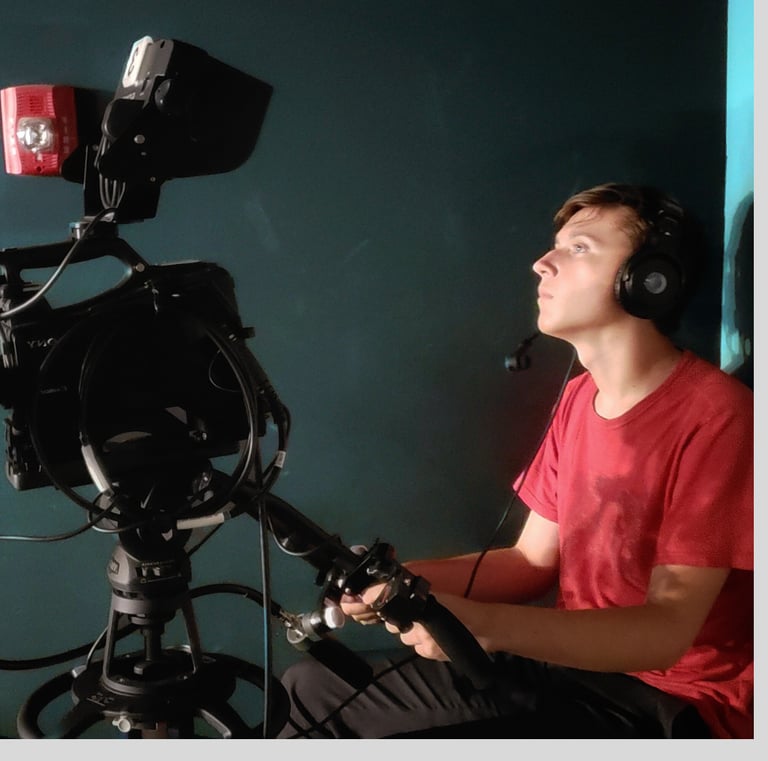 Reid Gorecki behind the camera in a tv studio