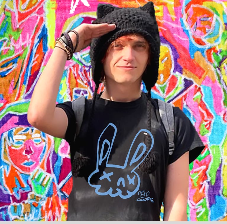 Reid Gorecki in Reid Gore tshirt saluting in a black cat hat