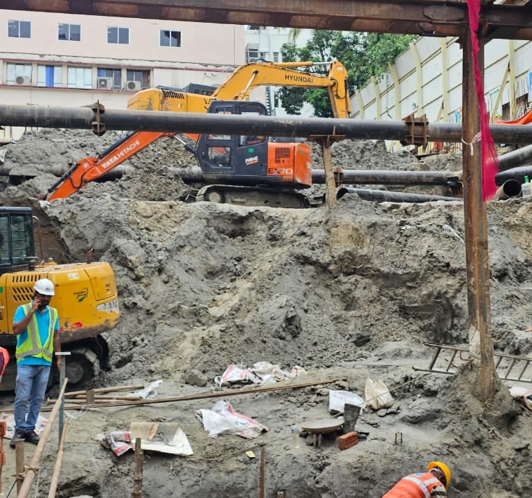 a group of construction workers working on a construction site