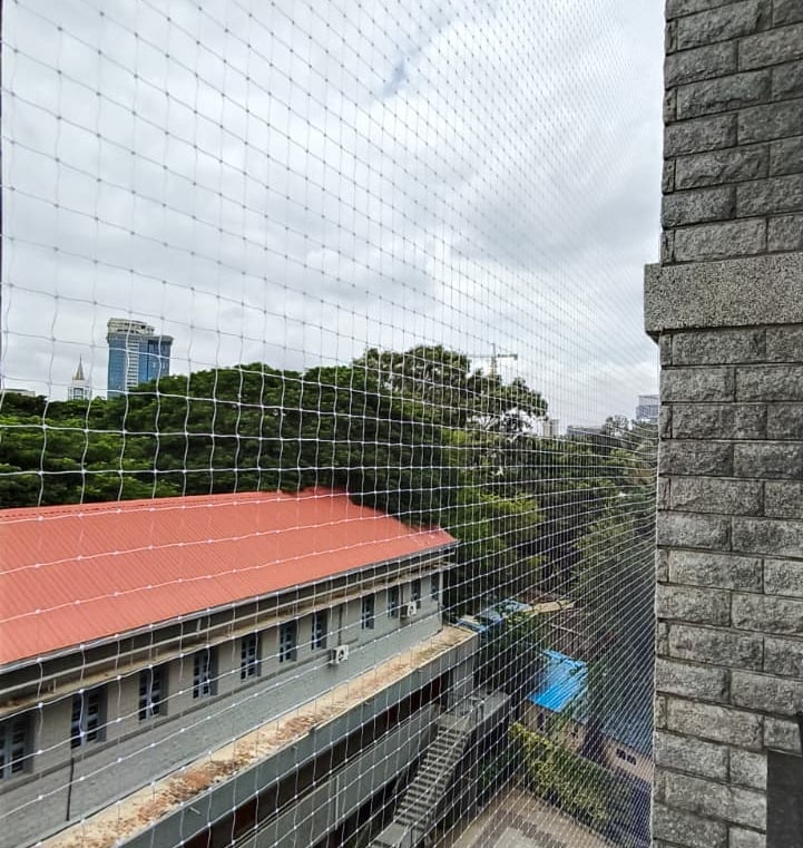 Close-up of the durable mesh material used in pet safety nets, highlighting texture and strength