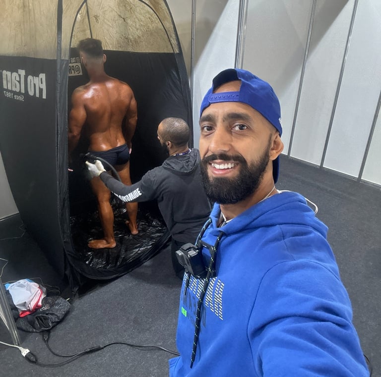 a man in a blue hoodie and a blue shirt