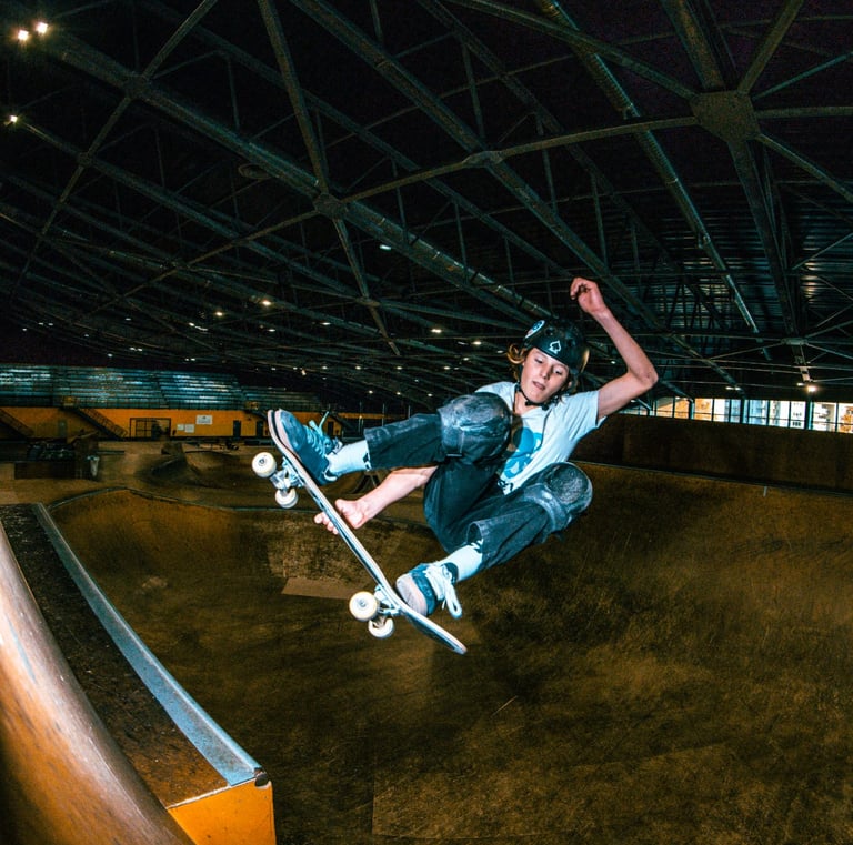 a man on a skateboard in the air pomge Marseille France skatepark