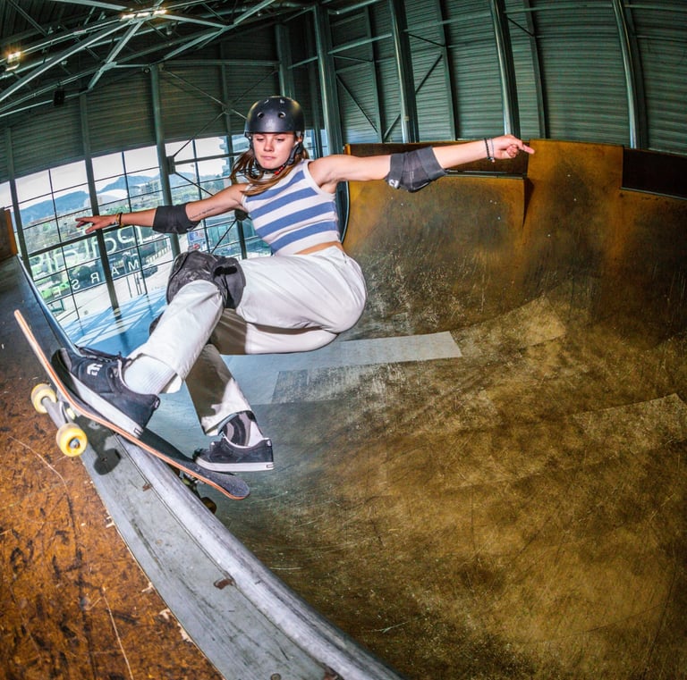 a skateboarder is doing tricks on a ramp pomge Marseille France skatepark
