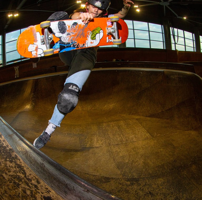 a skateboarder is doing tricks on a ramp pomge Marseille France skatepark