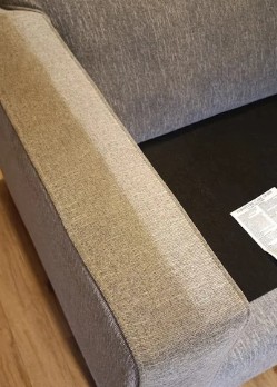 Nettoyage professionnel d’accoudoir de canapé gris en tissu par NetT à Toulouse