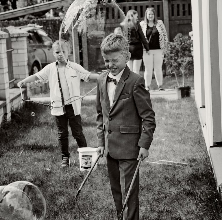 a man in a suit and tie is holding a cane cane and a cane cane