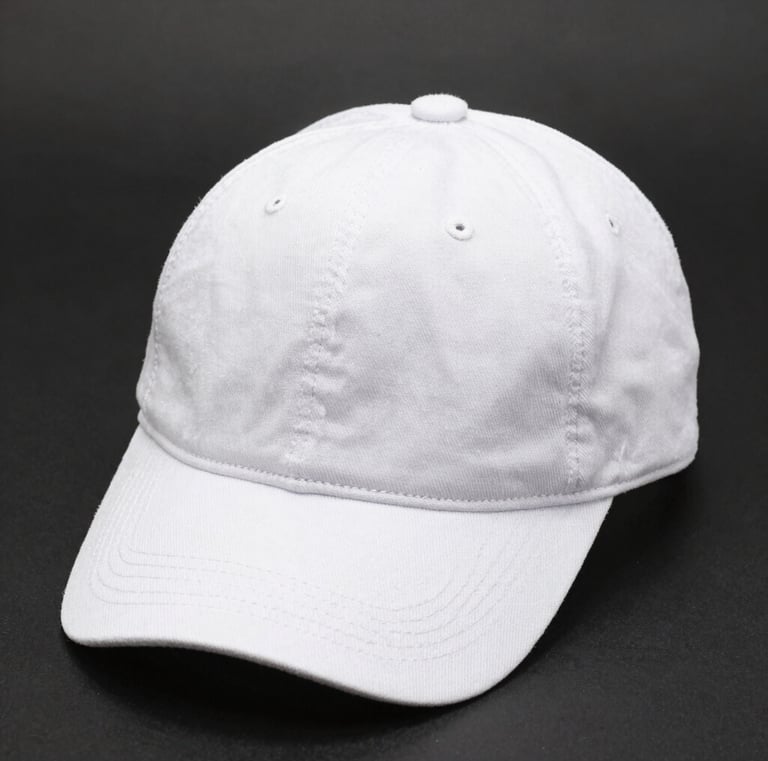 A red, white, and black sneaker is placed on a gray background near a small container labeled 'hmd'. The sneaker features a prominent swoosh logo and has a combination of leather textures.