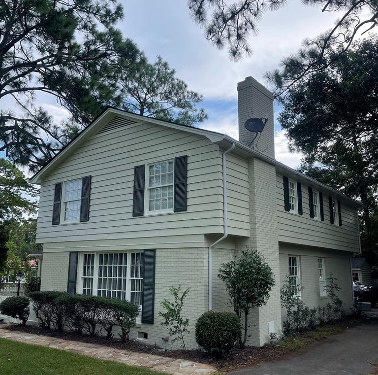 esidential exterior house painting project completed by Garnet Painting & Remodeling in Douglas, GA.