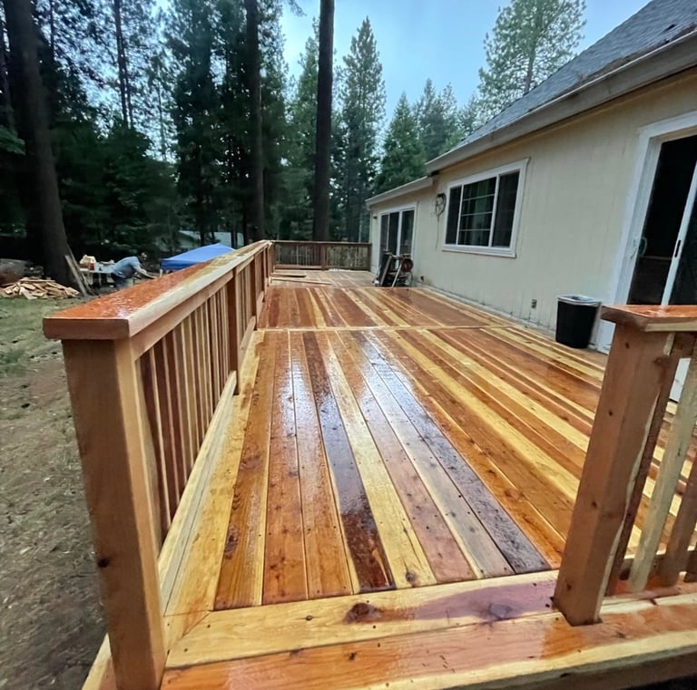 Redwood deck with a polished picture frame boarder 