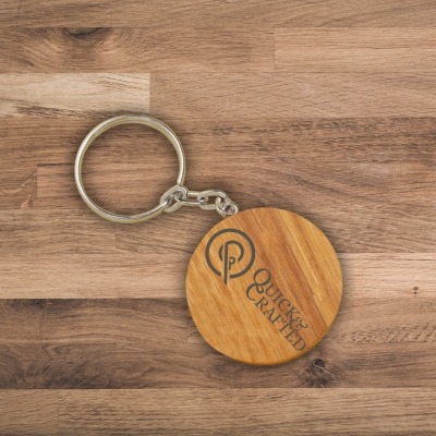 wooden keychain with quick and crafted logo