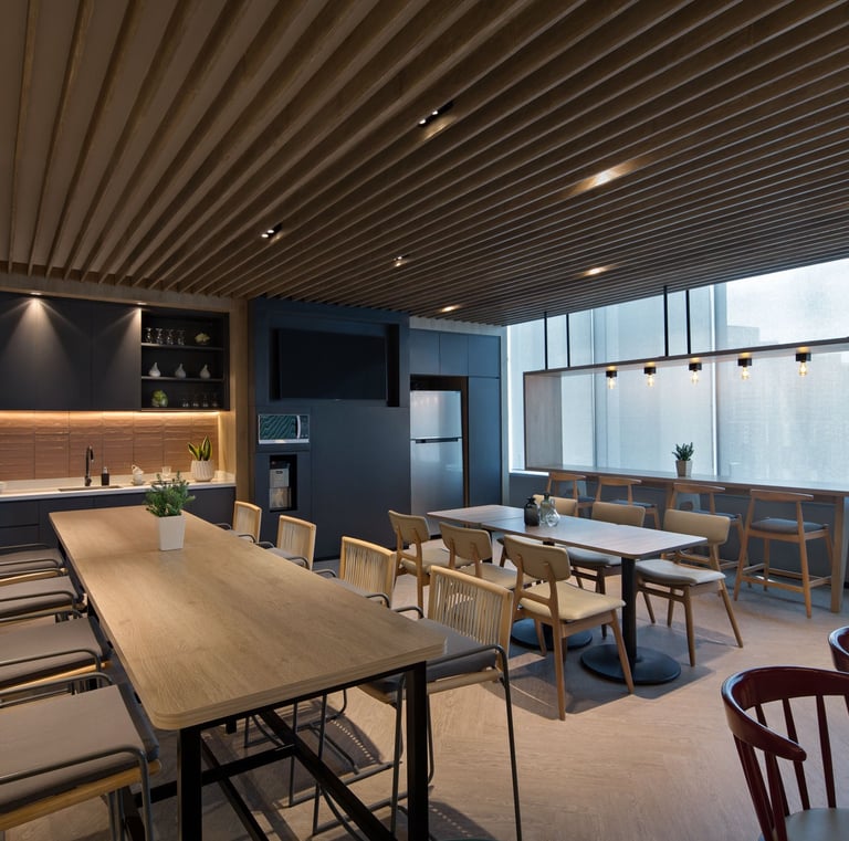a office room with a table and chairs