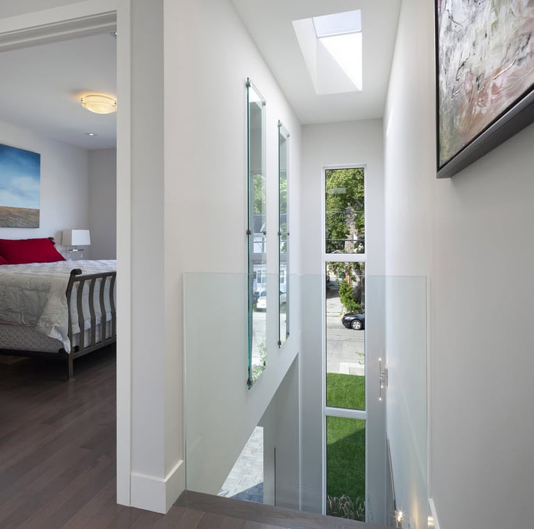 a bedroom with a bed and a bed in the middle of the room