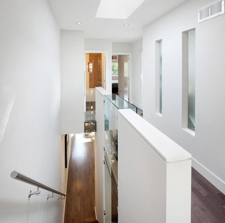 a staircase leading to a loft apartment