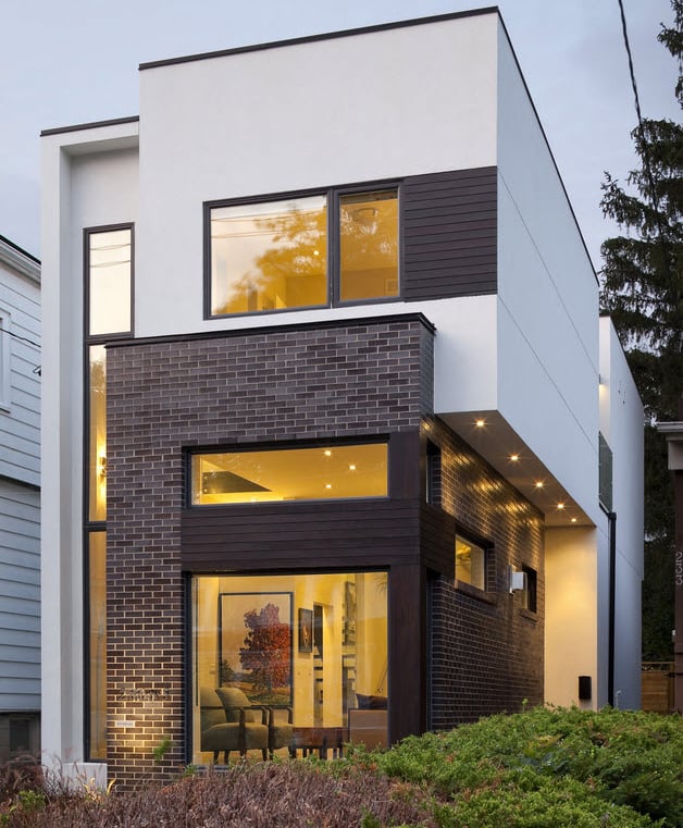 a modern house with a large window and a view of the outside
