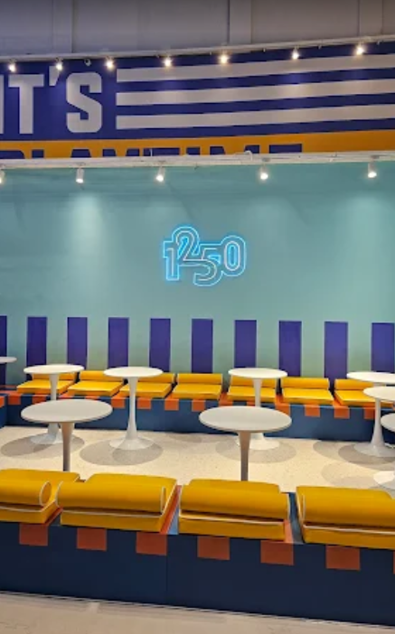 a booth booth with a large number of tables and benches