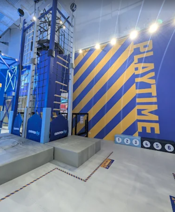 a large blue and yellow wall with a large blue and yellow wall