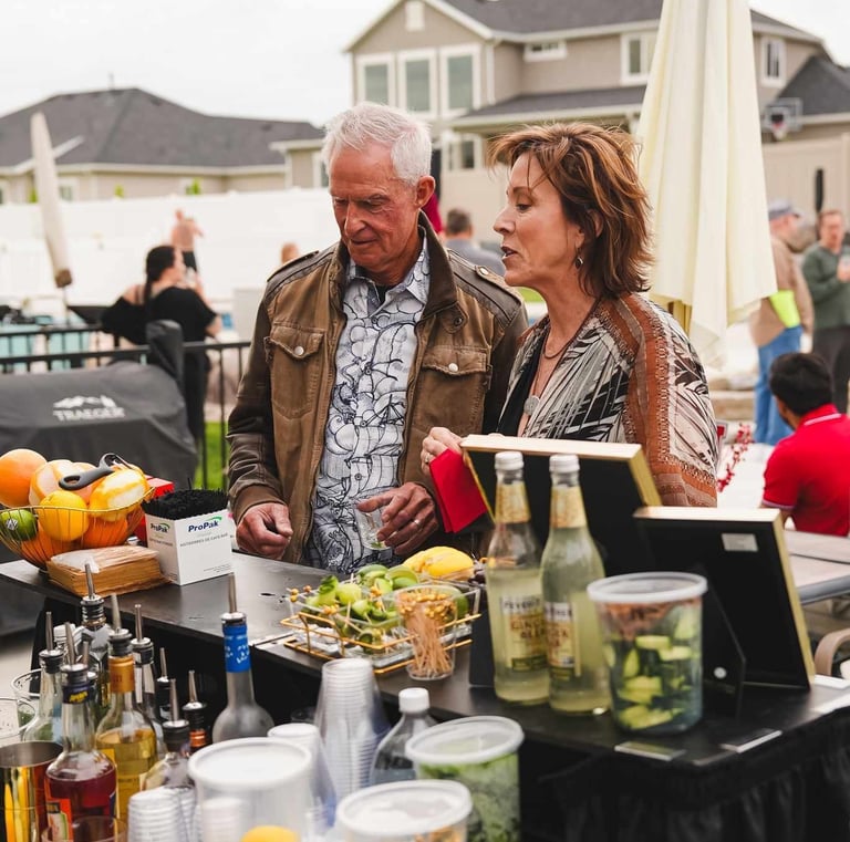 Guests ordering drinks at the bar