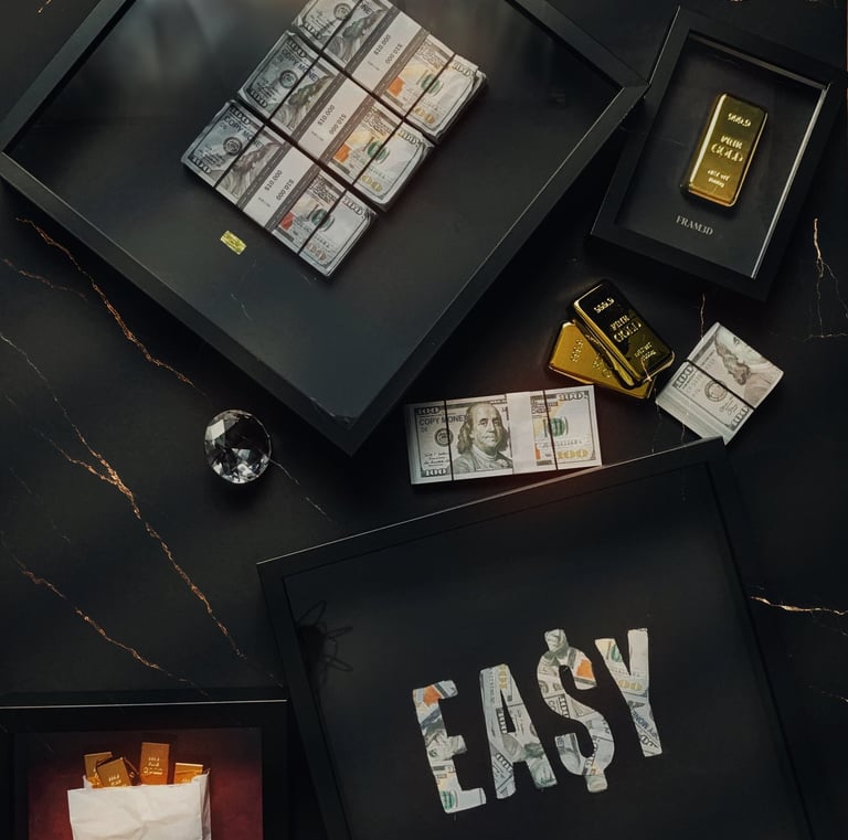 frames with money and gold bars in a marble background