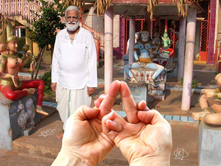 Sri Amritananda walking in the Meru Temple