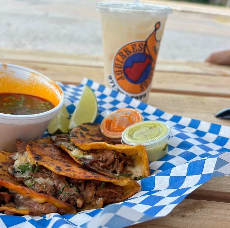 a plate of food with a drink and a drink
