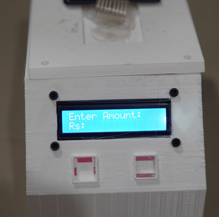 a white electronic device with a blue screen