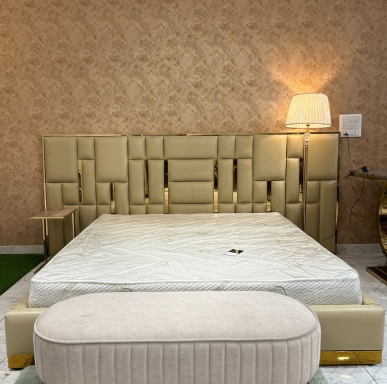Modern bedroom furniture set in Bengaluru with upholstered bed and mattress