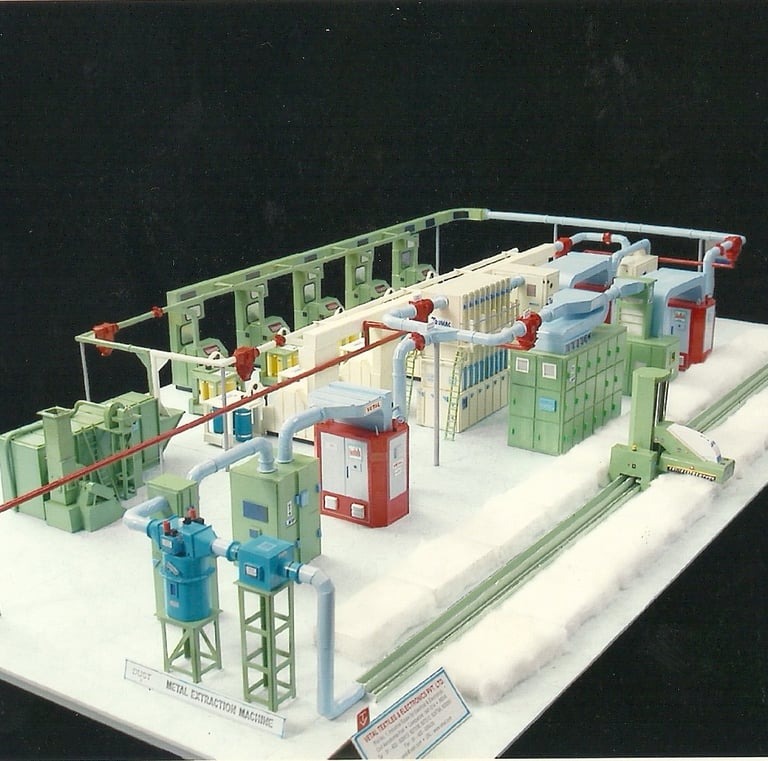Scale model of an industrial Cotton extraction machine and automated processing plant layout.