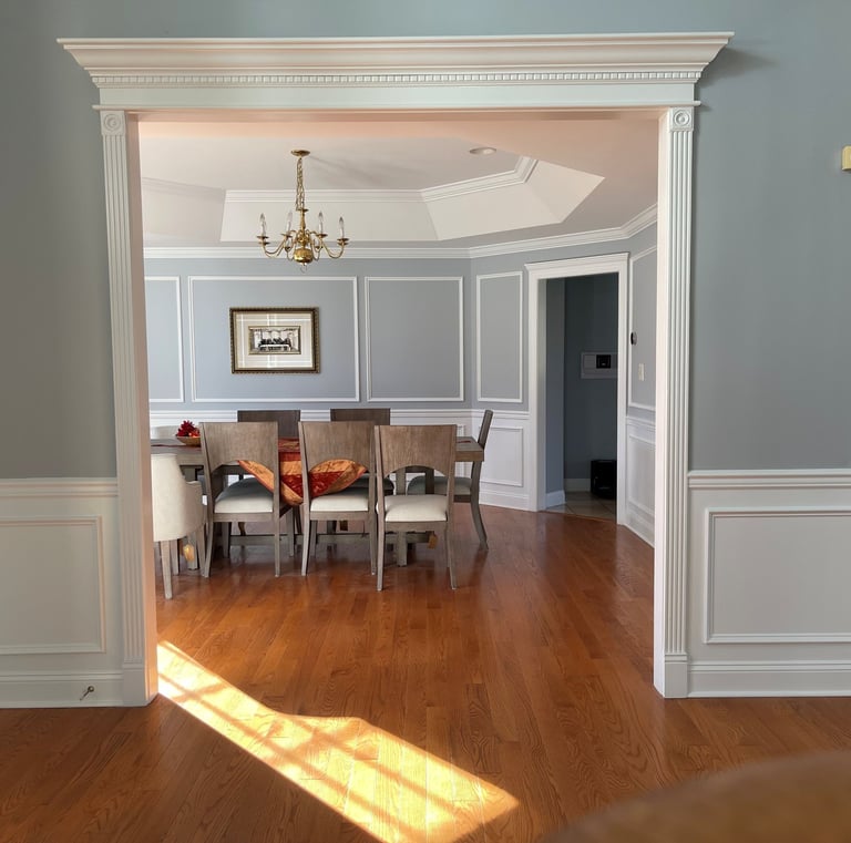 Custom wainscoting and doorway trim in a Monmouth County dining room