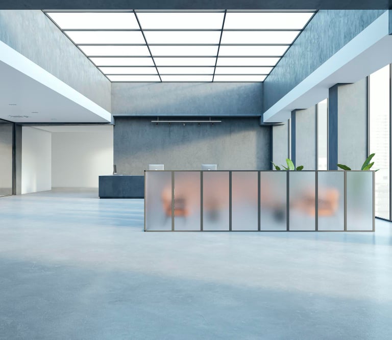 Professional house painters in Auckland working on commercial property