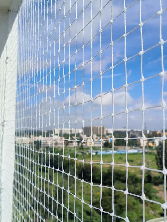 Wide view of a residential balcony in Cuffe Parade fitted with balcony safety net by Arjilli Safety 