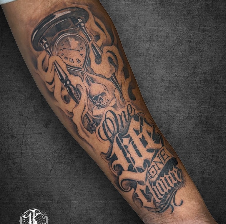 Custom arm tattoo with bold lines and smooth gradients