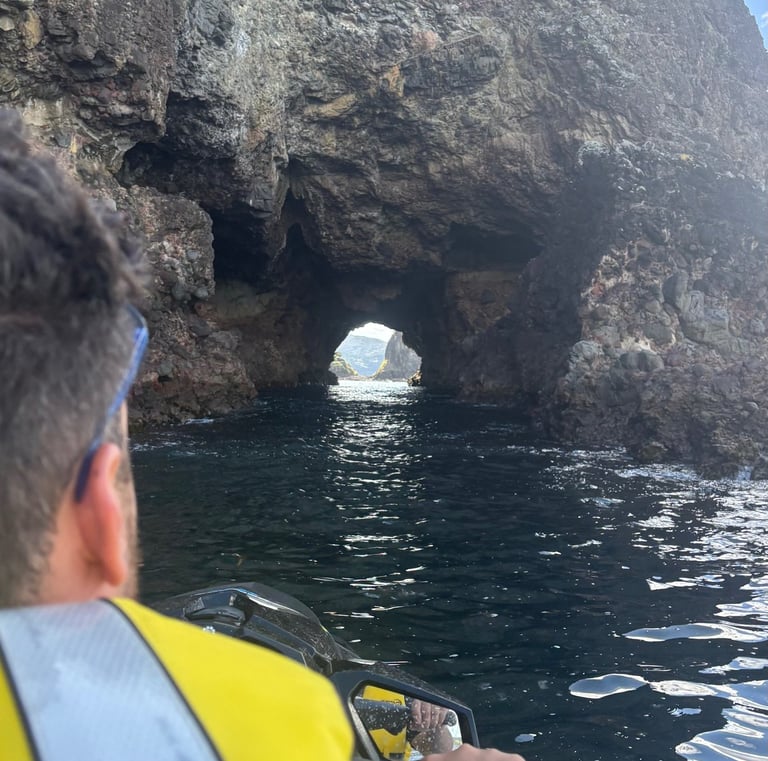 jetski rental riding through a picturesque cave